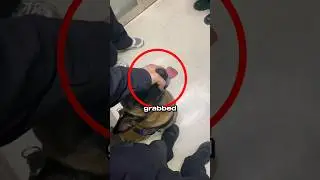 This police officer had to grab his dog's mouth
