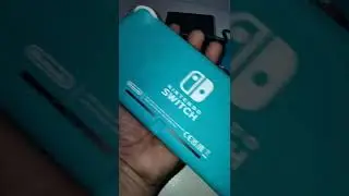 Nintendo Switch Lite(Blue) With box and Cover Mint Condition Rarely used + 5 Games 8460940196