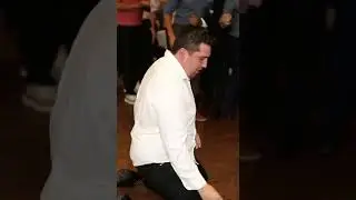 Groom gets surprised with beer during garter toss