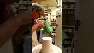 Turning a bottle oven shape.