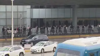 American Airlines pilots picket at O'Hare Airport after union authorizes strike