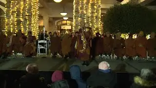Monks 'Walk for Peace' arrive in Greensboro and address crowd