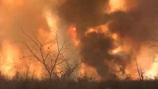 Firefighters work for third week to contain fires in Bolivia