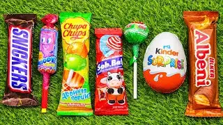 Most Asmr popular candys some lots of colorful rainbow lollipop candy unpacking chocolate eat