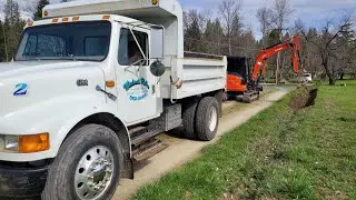 Stumpin ditch cleaning & drilling with the Kubota KX-040
