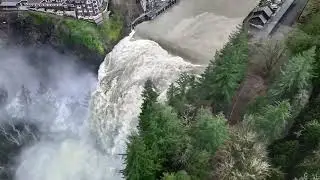 Washington state Snoqualmie Falls swell during the atmospheric river passing through the region