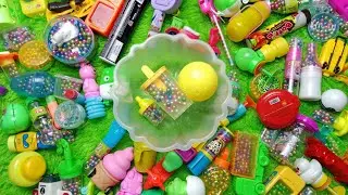 Asmr video shares the characters of plastic candy container ice cream, big ball and color balls