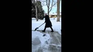 Dana shoveling off the front porch, Tulsa Snow Storm, Jan. 25, 2026