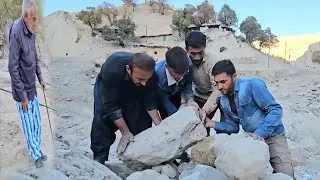 Living in the heart of wild nature Shaban and Salahuddin hard work to build a path for the villagers