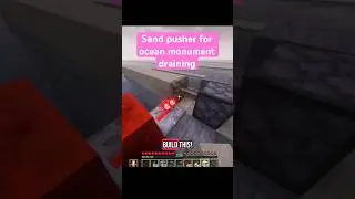 Sand pusher for draining an ocean monument