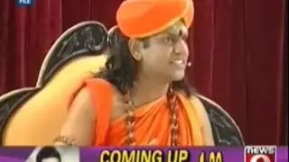 Non-Bailable Warrant Against Nithyananda & Others - Ramnagar Court Issues 28-Jul-2014-news9 tv