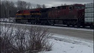 KCS 5013 leads train with CP 8623 Engine on the Canadian Pacific Railway CPKC