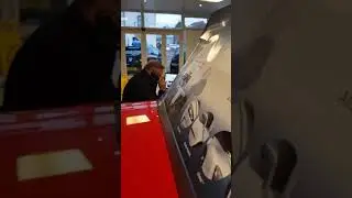 Pete at work ringing Timpsons the shoe people asking to speak to his shoes.