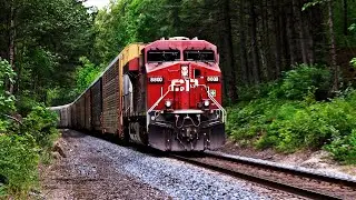 Big CPKC Trains With Multiple Mid DPUs Climbing Grade On The Cascade Sub