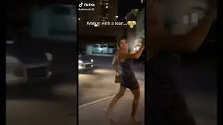 Drunk girl walking while leaning back