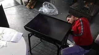 Deluxe Griller charcoal grill assembly and great lamb roast from Bunnings