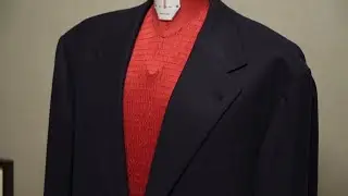 Creating a bespoke sport jacket made of T&L Super 200's wool with silver buttons.