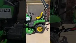 Selling John Deere 1023E Tractor