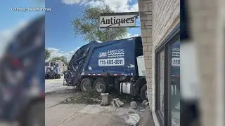 PHOTOS: Garbage truck crashes into antique shop in LaGrange Park