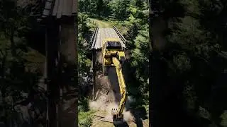 Yellow excavator falls unexpectedly 😳 #excavator #machinefall #constructionfail #heavymachine #short