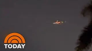 Flames seen shooting out of a plane, forcing emergency landing