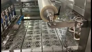 Butterfly jelly cup filling sealing machine