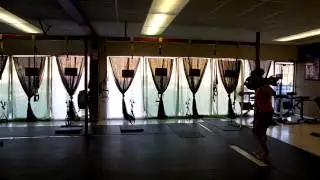 Nancy doing 85-pound barbell walking lunges at AlamoShape