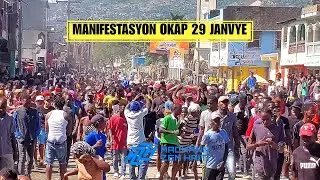 Flash! Okap Kanpe An Mòd Debranche Ariel! Plizyè Milye Moun Pran Lari, Drapo Larisi Ap Flote!