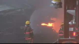 BREAKING - Crews continue to battle massive scrapyard fire in Benwood