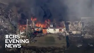 Arizona wildfire destroys homes and forces evacuations