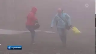 Wanderer w&auml;hrend Orkan Sabine auf dem Brocken in der Tagesschau