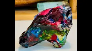 Rainbow Volcanic Glass Paleo Story Stone Face & Mammoth Effigy