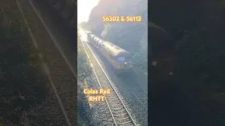 Water Cannons in Full Flow Colas Locos 56302 & 56113 Heading down the North Wales Coast