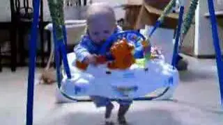 Autumn Faye jumping in her Jumperoo