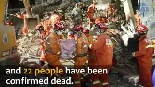 A girl protected by her dad&rsquo;s body was rescued after residential buildings collapsed