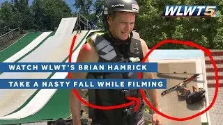 WATCH: WLWT Reporter eats it HARD while filming!