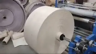 Roll toll paper embossing machine, roll paper graining machine. Mohindra machine.