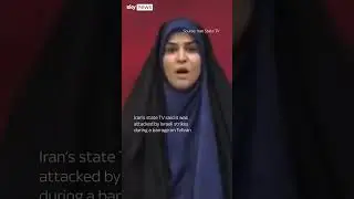 Moment Iranian state TV hit by strike