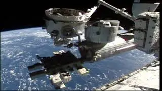 NEW AIRLOCK ATTACHED TO THE SPACE STATION
