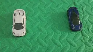 Orange gtr and black  bat  mabele and lamborghini  and  a Blue Lotus Evija 