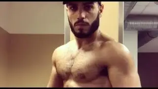 Obaid flexing his muscles
