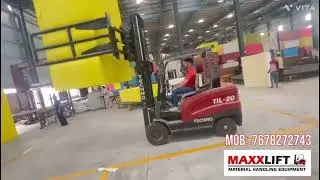 Electric forklift with bale clamp