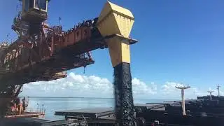 Capesize cargo loading (iron ore)