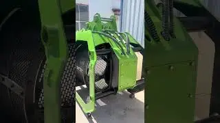 Hydraulic roller rotation and screening bucket