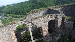 Flying over castle ruins in the town of Lipova, Romania