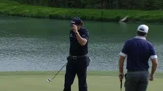 Phil Mickelson sinks a 14-foot putt for birdie at Shell
