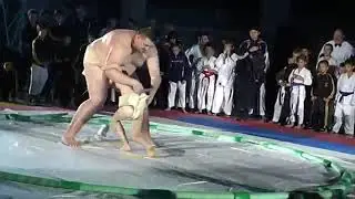 sumo wrestler against the kid