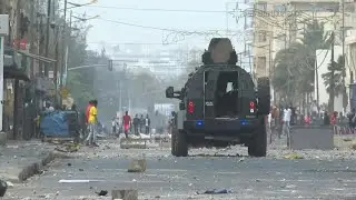 Clashes in Senegal as opposition leader held in custody | AFP