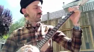 Telecanjo. Telecaster neck, cookie can banjo.