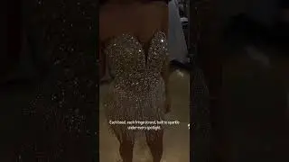 Share with a friend who would own the spotlight in this silver crystal fringe mini gown! To order,